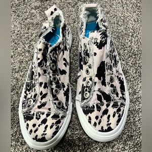 Women’s cow print sneakers